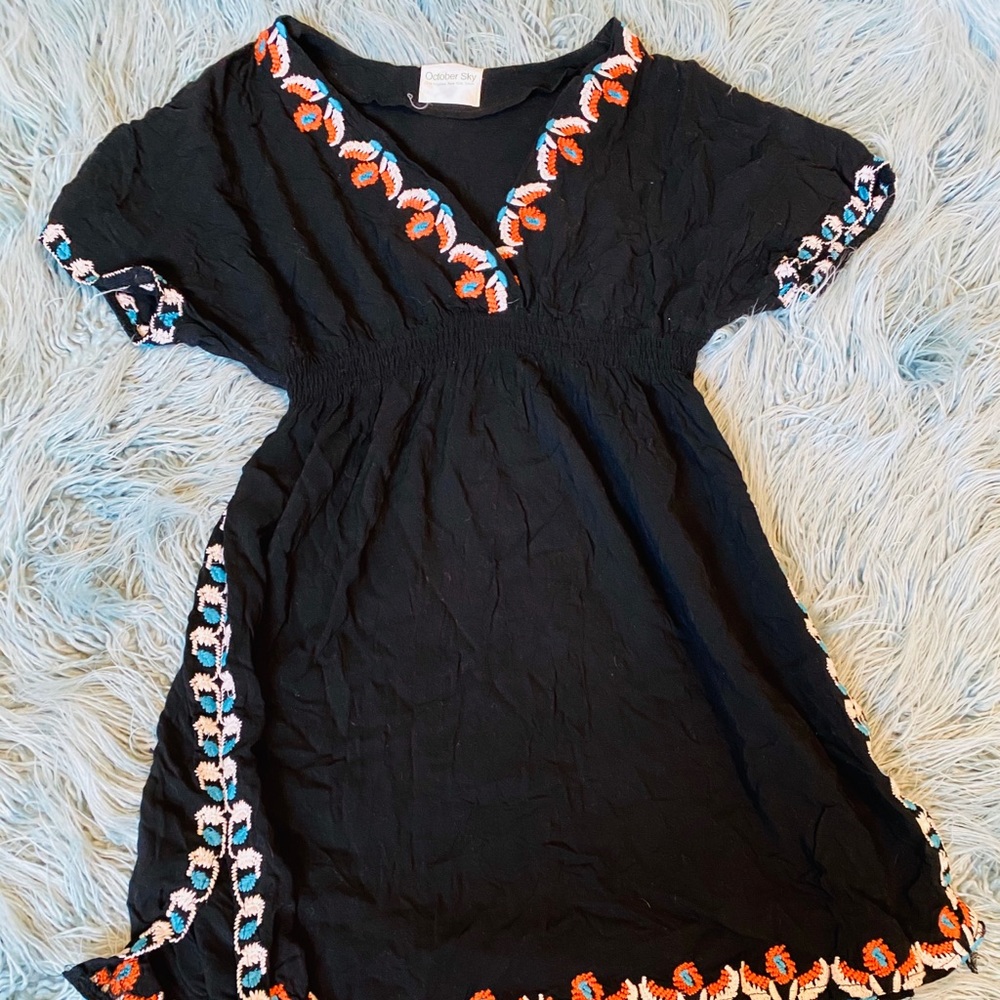 Black tunic with embroidered detail from boutique